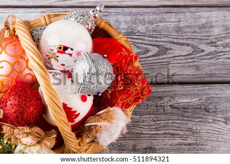 Basket with beautiful New Year's balls. Christmas decoration. Merry Christmas and Happy New Year!