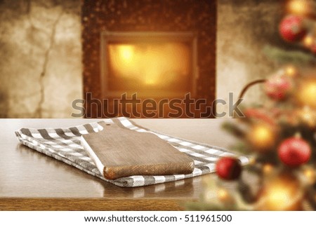 Christmas interior with fireplace and xmas tree and wooden desk of free space for your decoration 