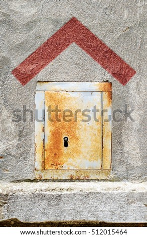 Small metallic door as a concept of home. House symbol sign.