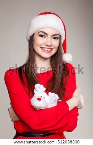 young beautiful girl in the studio for the new year, christmas