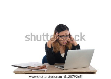 Stressed young business woman at the desk with a laptop isolated on white background.