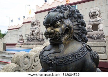 steel lion sculpture on the spectacular temple in thailand.