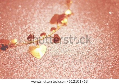 gold hearts and gold abstract glowing Christmas background