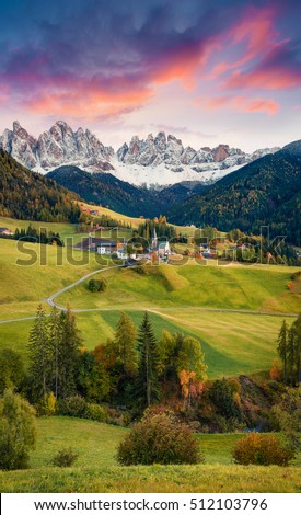 Magnificent view of Santa Maddalena village in front of the Geisler or Odle Dolomites Group. Colorful autumn sunset in Dolomite Alps, Italy, Europe. Artistic style post processed photo.