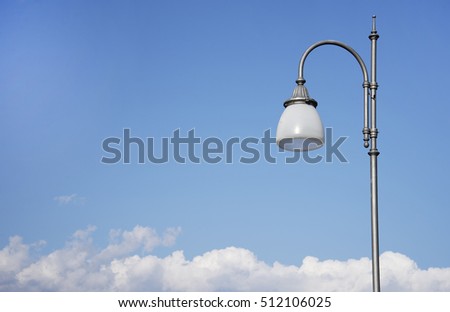 Street lamp with blue sky.