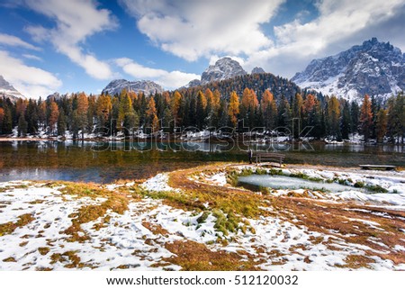 Sunny morning scene on Antorno lake. Colorful autumn landscape in National Park Tre Cime di Lavaredo, Dolomite Alps, South Tyrol. Location Auronzo, Italy, Europe. Artistic style post processed photo.