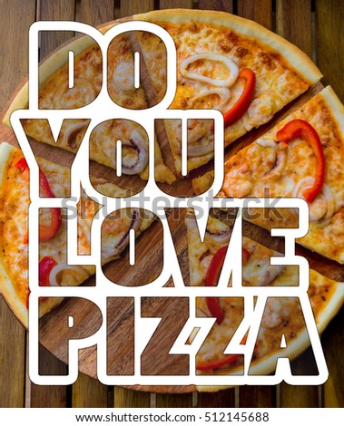 Print "DO YOU LOVE PIZZA". Large pizza on a wooden table. Restaurant