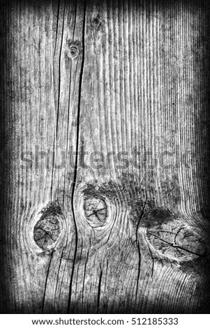 Old Knotted Wood Weathered Rotten Cracked Bleached And Stained Dark Gray Vignetted Grunge Texture