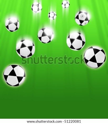 Footballs on a green background