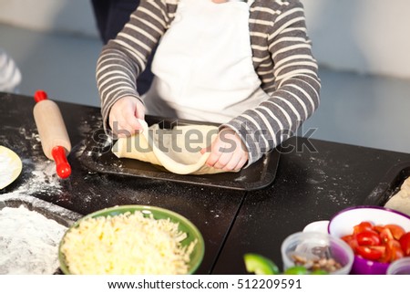 Children's master class in cooking pizza
