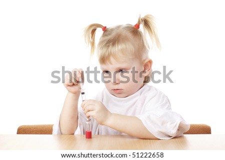 child playing as a scientist with syringe