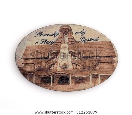 Magnetic souvenir from Slovakia with the astronomical clock in the town of Stara Bystrica isolated on white background. The inscription on Slovak language means "Slovak Astronomical Clock"
