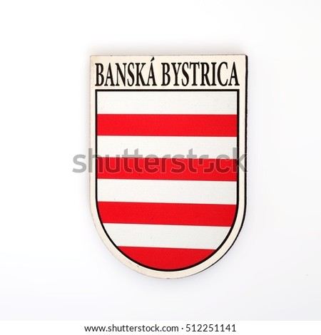 Magnetic souvenir from Slovakia with coat of arms of the city of Banska Bystrica isolated on white background. The inscription on the Slovak language means "Banska Bystrica" in English