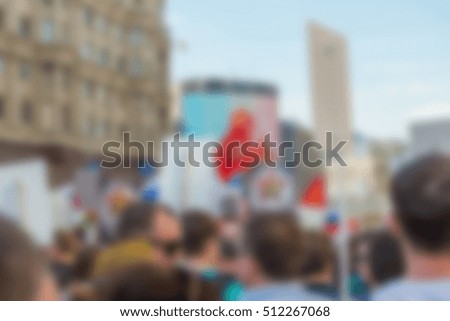 Large crowd parade theme creative abstract blur background with bokeh effect