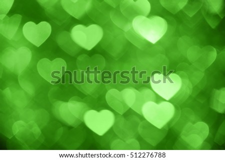 green heart bokeh background photo, abstract holiday backdrop