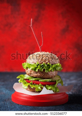 Homemade hamburger with fresh vegetables, selective focus