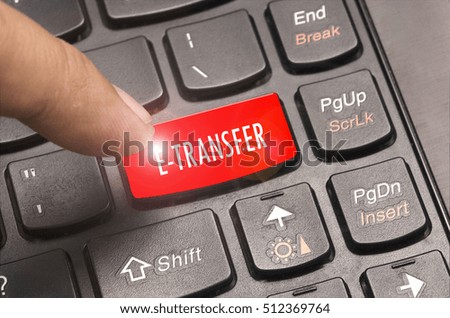 E-Transfer word on red keyboard button.
