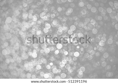 abstract background White bokeh circles for background. bokeh of water fly and lights on white background. Blue Festive Christmas elegant abstract background.