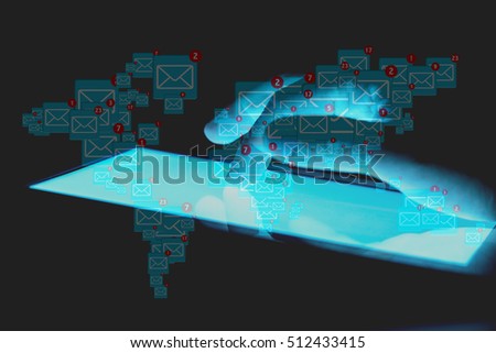 Backlit touch screen tablet and the concept of sending e-mails as a marketing business.