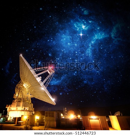 Satellite Antenna under beautiful star in blue sky. Elements of this image furnished by NASA.