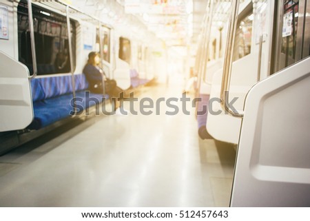 Blurred city people lifestyle background, inside the train.