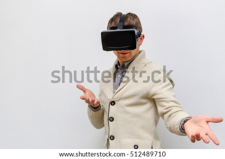 Man in virtual glasses imagining himself a spiderman