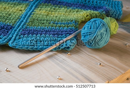 knitting and yarn on a beautiful background