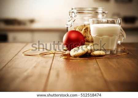 cookies and milk in kitchen and xmas time 