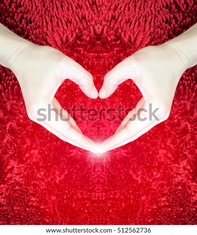 hands making heart on red fluffy background.valentines day concept.Love concept.
