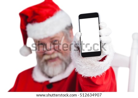 Portrait of santa claus showing mobile phone against white background