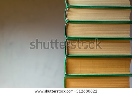 a collection of books in the volumes containing the story on their pages and wealth knowledge hidden inside / a rich collection of books 