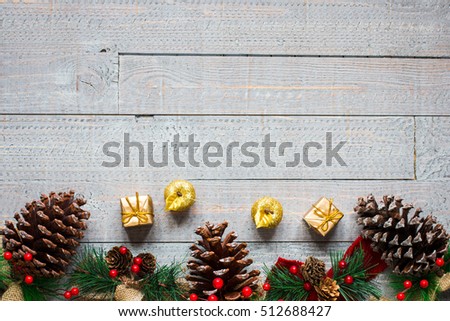 Christmas collection, gifts and decorative ornaments, over wooden background