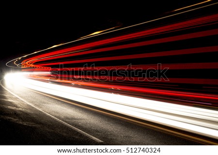 Truck light trails in tunnel. Art image . Long exposure photo taken in a tunnel 