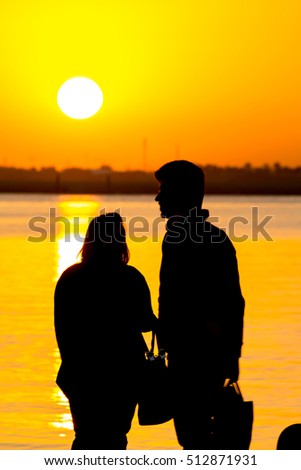 Couple enjoying sunrise 