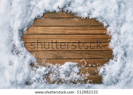 empty wooden background with snowflakes. top view. place for text  Royalty-Free Stock Photo #512882131