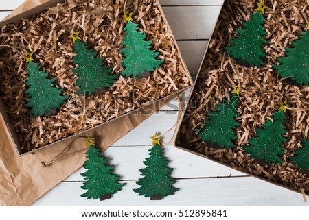  Christmas decorations on rustic wooden background. Christmas tree