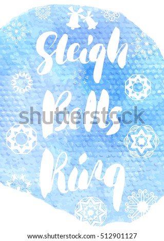 Sleigh Bells Ring - ink freehand lettering. Modern brush calligraphy, isolated on blue watercolor texture background.