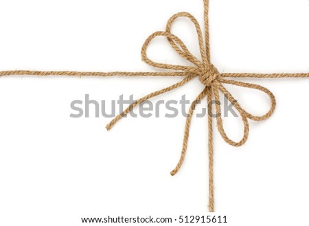 Rope with bowknot, isolated on white background, close-up. Royalty-Free Stock Photo #512915611