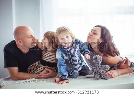 portrait of beautiful mommy,daddy and lovely childrens