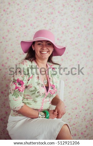 nice portrait of a beautiful and nice woman in hat