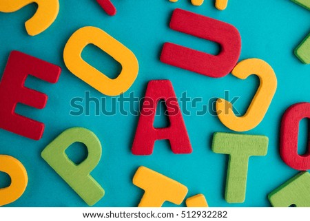 colorful letters on blue background