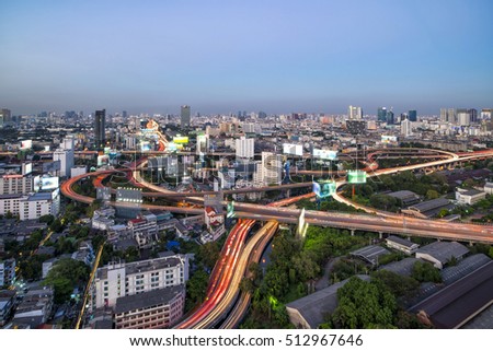Express way at twilight time in Bangkok, Thailand (With long exposure photography created movement of car light and blur trademark, brand, logo)
