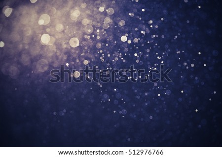 abstract background all colors bokeh circles for background. bokeh of water fly and lights on black background.Blue Festive Christmas elegant abstract background. Vintage Royalty-Free Stock Photo #512976766