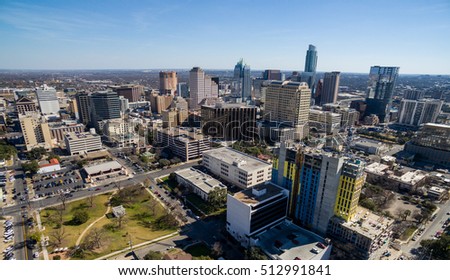 Austin Texas Aerial drone shot above the Texas Hill Country Capital Cities Skyline Cityscape with Frost Bank tower on a sunny day in Summer