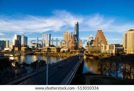 Evening Sunset in Austin Texas Down Texas State Capitol View south congress avenue bridge. Long Perspective down office buildings and Austonian and Frost Bank Tower