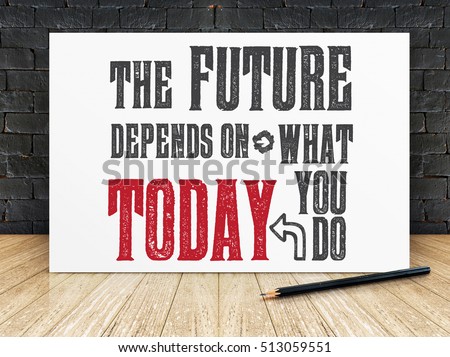Inspiration quote : "The future depends on what you do today" on white frame in black brick wall and wooden flooring ,Motivational typographic.