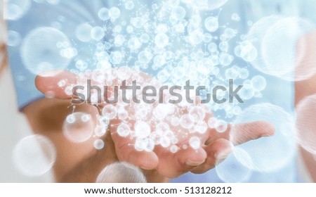 Businessman on blurred background holding 3D rendering data network sphere in his hand