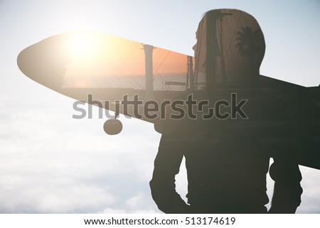 Woman and airplane silhouettes on city and sky background with sunlilght. Vacation concept. Double exposure
