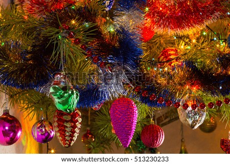 Beautiful background decorated Christmas tree with toys. The idea for postcards. Soft focus. Shallow DOF