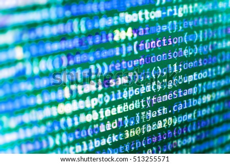 Binary digits code editing. IT coding on monitor screen. Software source code. Software abstract background. Desktop PC monitor photo. Mobile app developer. 
